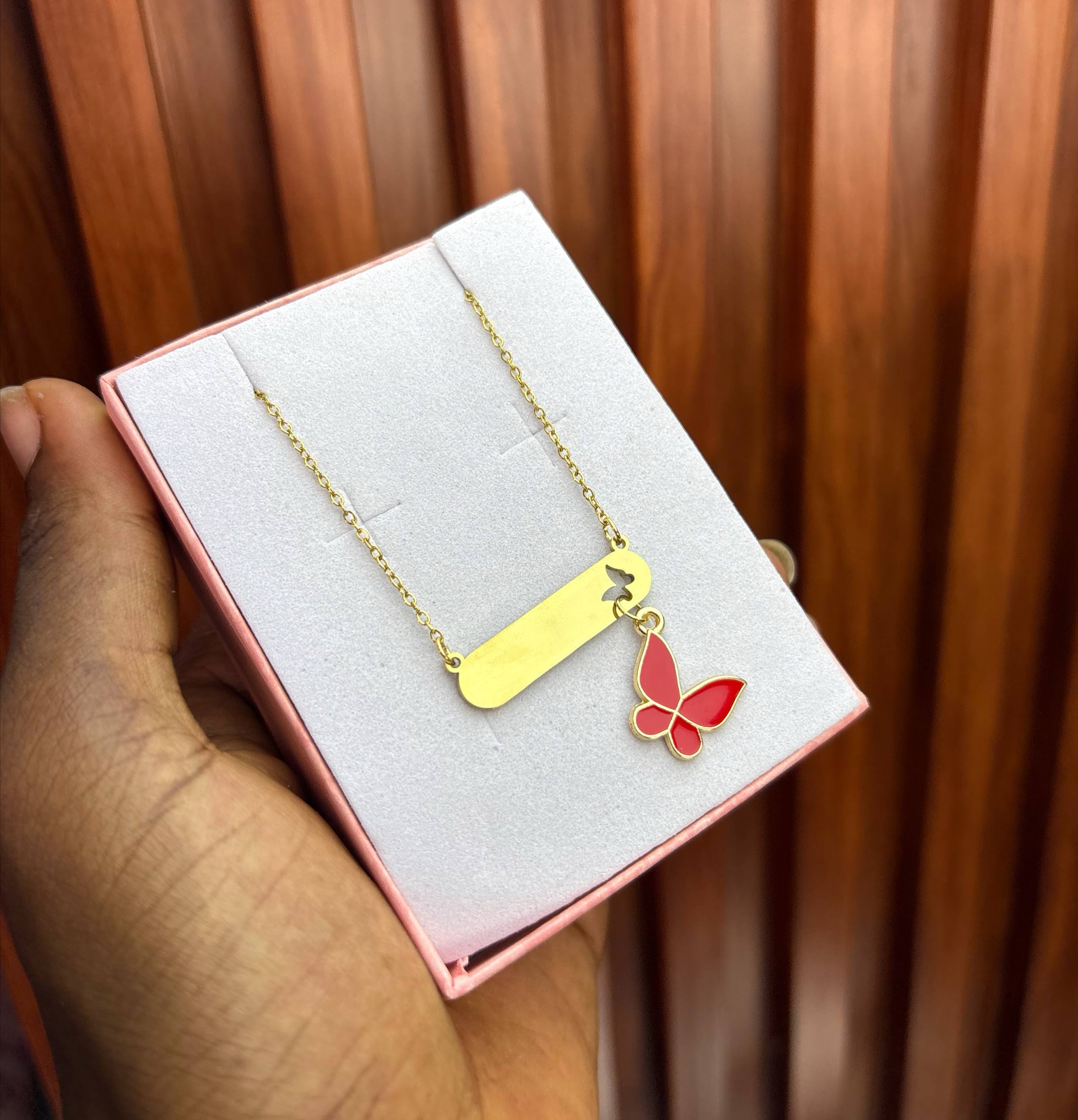 photo_2026-02-04_20-16-25 ENGRAVED FEMALE CHAIN (RED BUTTERFLY DROP) - Image 1